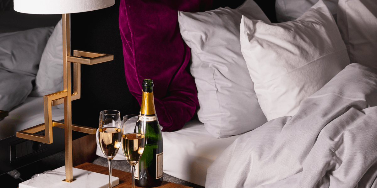 Hotel Room Bed with Champagne