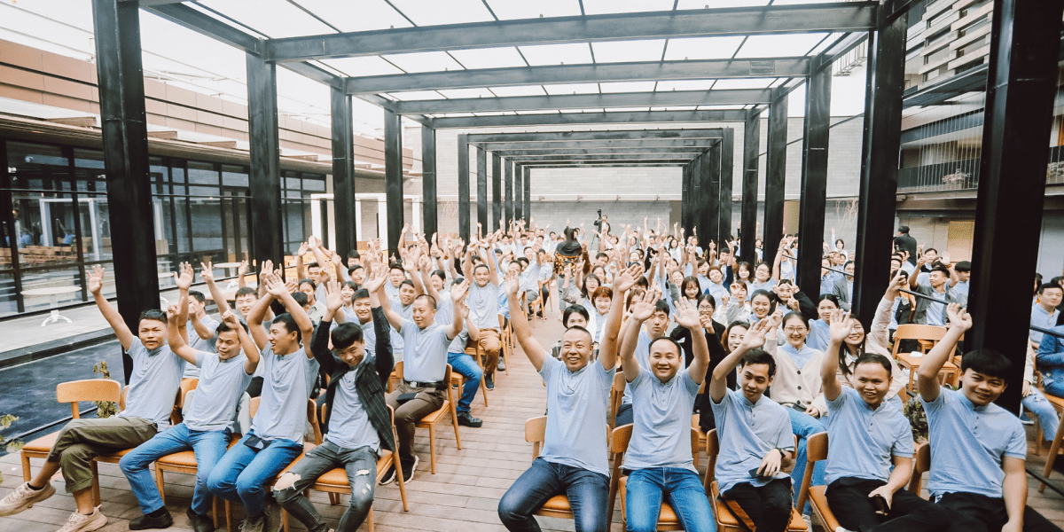 Team cheering at a gathering