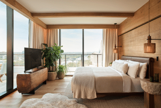 Bedroom of 1 Hotel Austin's Lake Terrace Suite with views of Lady Bird Lake