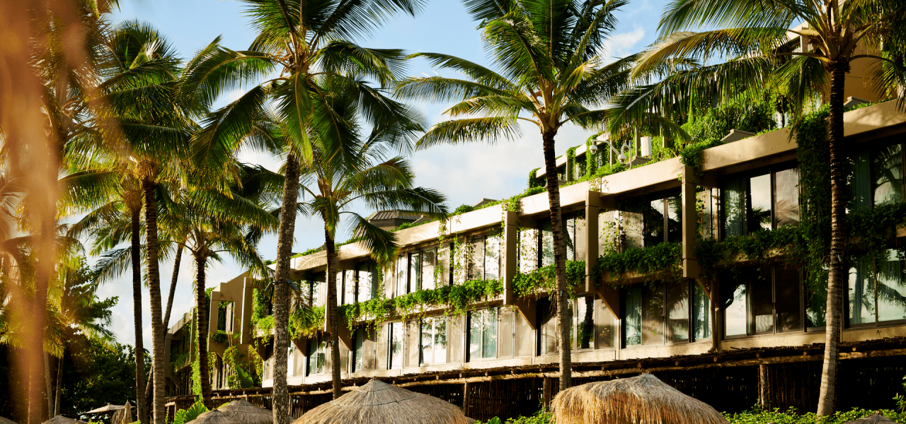 Hotel overlooking poolside cabanas